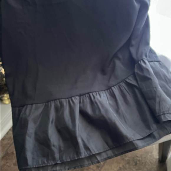 2 dresses. Black Polka Dot Tiered Dress & Solid Black Ruffle Hem Dress - Picture 7 of 7